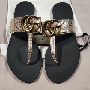 Gucci Black Footbed Sandals with Metallic Gold Straps and GG Hardware